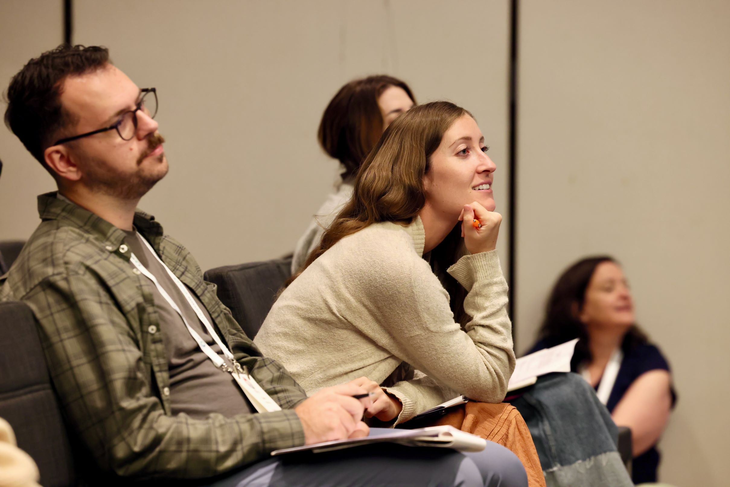 2025EMDRIAConferenceAttendeeEngaged Woman listening intently at the 2025 EMDRIA Conference